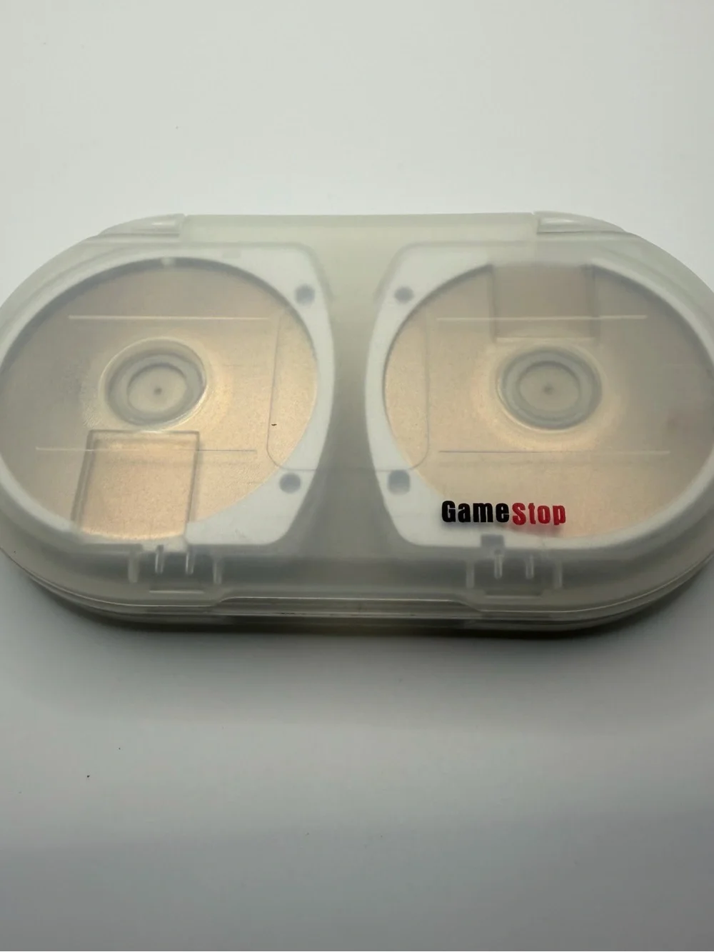 Sony PSP UMD Disc 8-Pack in Clear White Case (7 games, 1 movie)